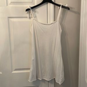 White dress with tie bows